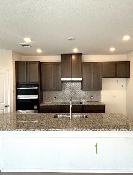 Furnished interior view inside a new home in Retreat at San Gabriel, Georgetown (Image 18).