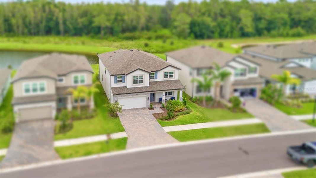 Front exterior of a new home in , Tampa, FL, highlighting curb appeal (Image 32).