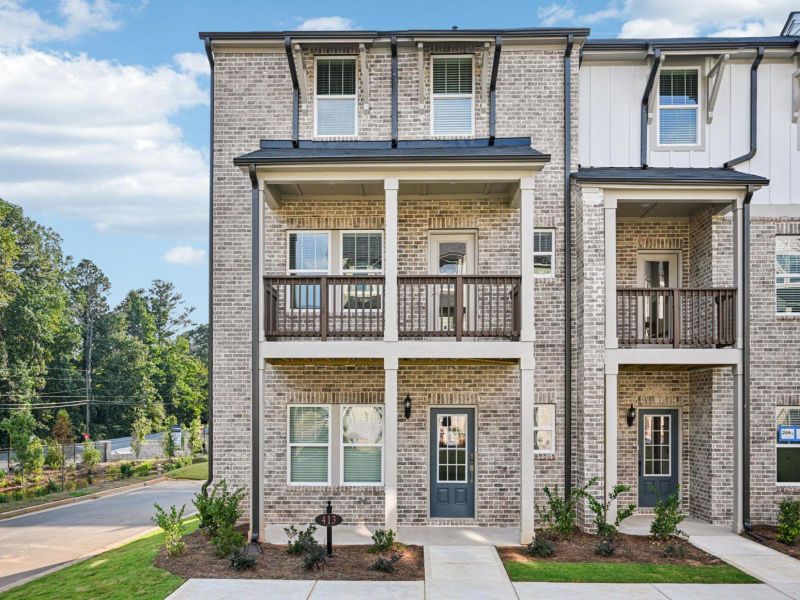 Front exterior of a new home in Martin Springs - Highland Series, Lawrenceville, GA, highlighting curb appeal (Image 1).