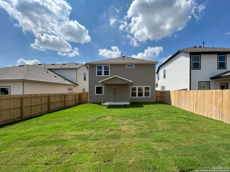 Front exterior of a new home in Enclave at Hennersby Hollow 50's, San Antonio, TX, highlighting curb appeal (Image 22). Front exterior of a new home in Enclave at Hennersby Hollow 50's, San Antonio, TX, highlighting curb appeal (Image 22).