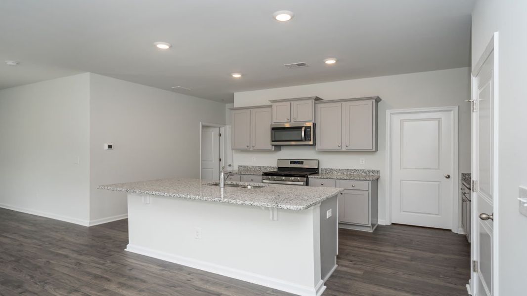 Representative furnished interior of a home built from the ROBIE by D.R. Horton in Island Green, Myrtle Beach (Image 6).