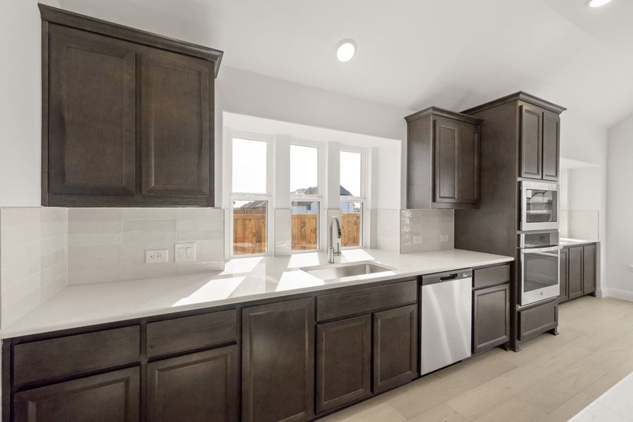Representative furnished interior of a home built from the Sandstone II by Pacesetter Homes in Timberbrook, Justin (Image 7).