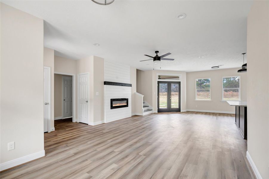 Family room view as you enter the home. Space to the right is flex and can be a desk/work area or more of a formal dining area.
