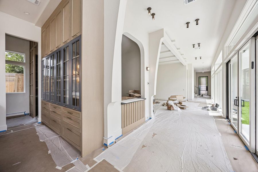 The proportions in this home are generous, high ceilings, wide passage, and elongated sightlines - contributing to an airy, open feel. Construction as of June 1st, 2026.