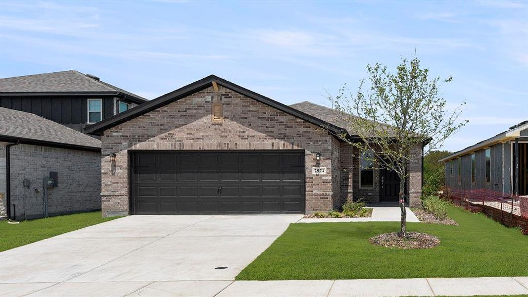 Front exterior of a new home in Churchill 40s, Anna, TX, highlighting curb appeal (Image 17).