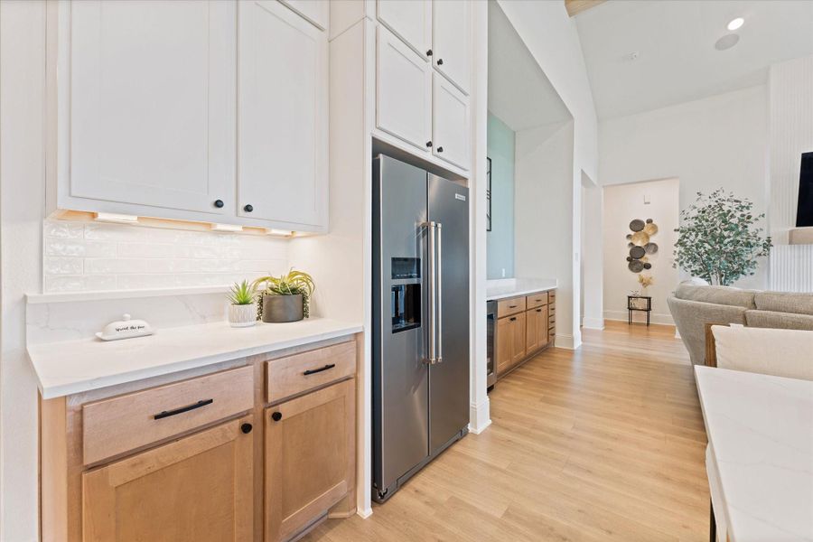Kitchen with abundant storage.