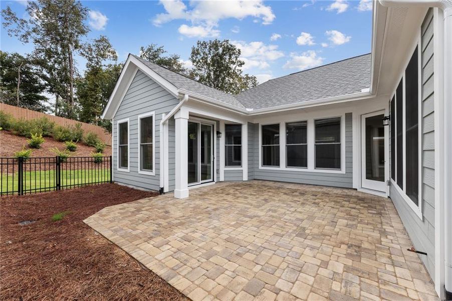 Exterior details and patio area of a home in The Courtyards at Bailey Farm, Dacula (Image 3).