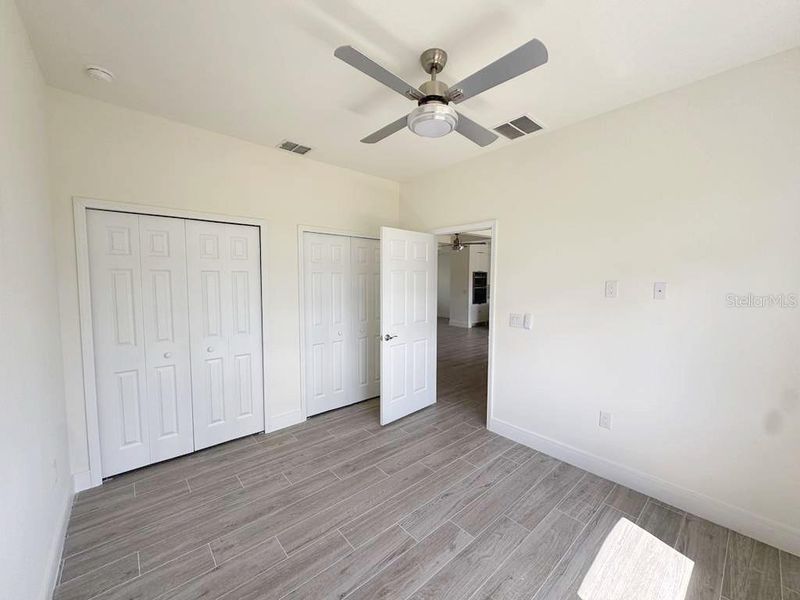 Spacious, unfurnished interior of a new home in , Port Charlotte (Image 15).