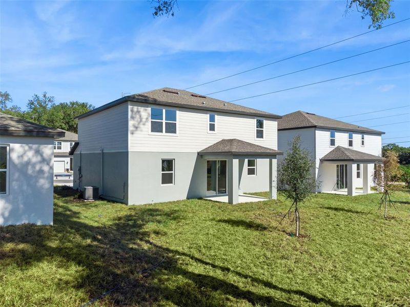Exterior details and patio area of a home in Estes Reserve, Eustis (Image 3).