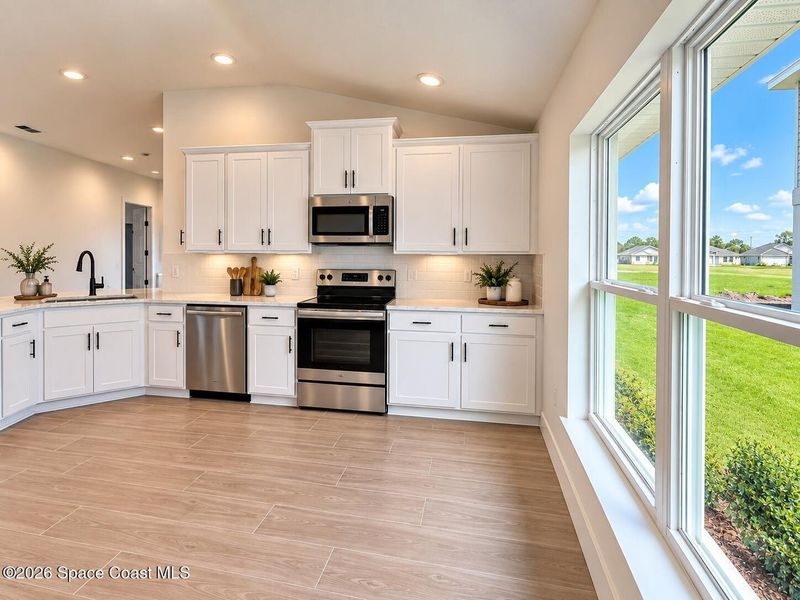 Furnished interior view inside a new home in St. John's Preserve, Palm Bay (Image 8). Furnished interior view inside a new home in St. John's Preserve, Palm Bay (Image 8).