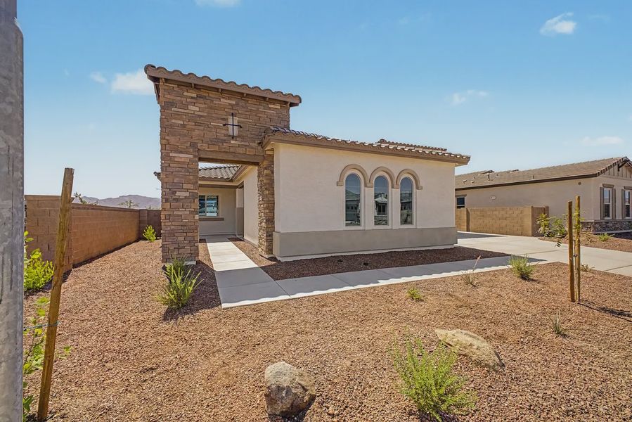 Exterior details and patio area of a home in Valencia at Granite Vista, Waddell (Image 3).