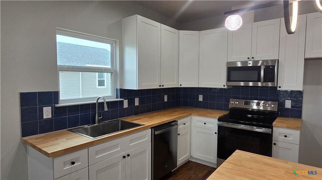Furnished interior view inside a new home in , Port Lavaca (Image 3).