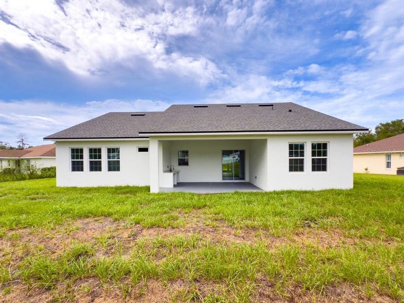 Front exterior of a new home in , Ocala, FL, highlighting curb appeal (Image 19).