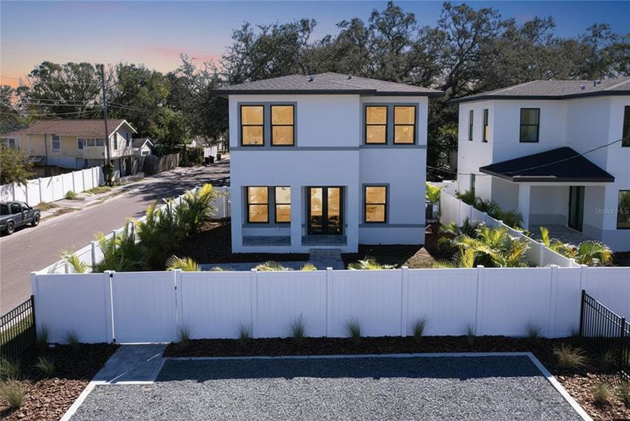 Front exterior of a new home in , St. Petersburg, FL, highlighting curb appeal (Image 31).