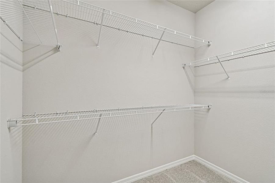 Spacious, unfurnished interior of a new home in Laureate Park at Lake Nona - Garden Series, Orlando (Image 27).