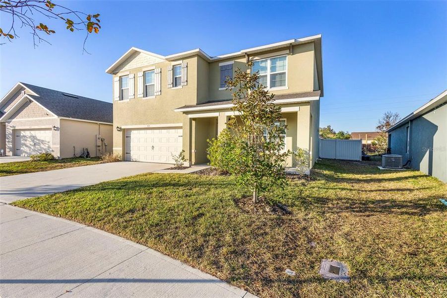 Front exterior of a new home in Cadence at Parc Hill, Orange City, FL, highlighting curb appeal (Image 22).