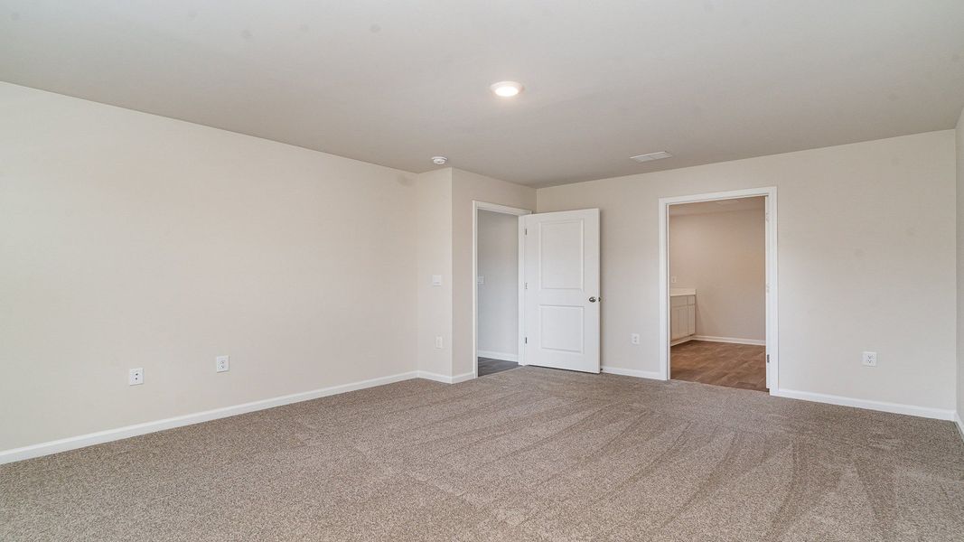 Spacious, unfurnished interior of a new home in Stanbury Creek, Supply (Image 7).