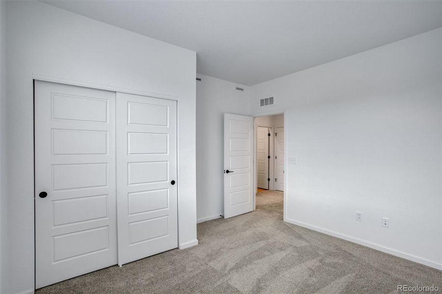 Spacious, unfurnished interior of a new home in Westside Crossing Townhomes, Berthoud (Image 20).