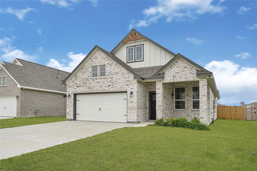 Front exterior of a new home in , League City, TX, highlighting curb appeal (Image 1). Front exterior of a new home in , League City, TX, highlighting curb appeal (Image 1).