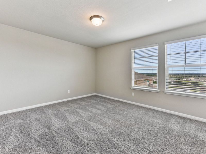 Spacious, unfurnished interior of a new home in Big Sky Ranch - Executive Collection, Dripping Springs (Image 17).