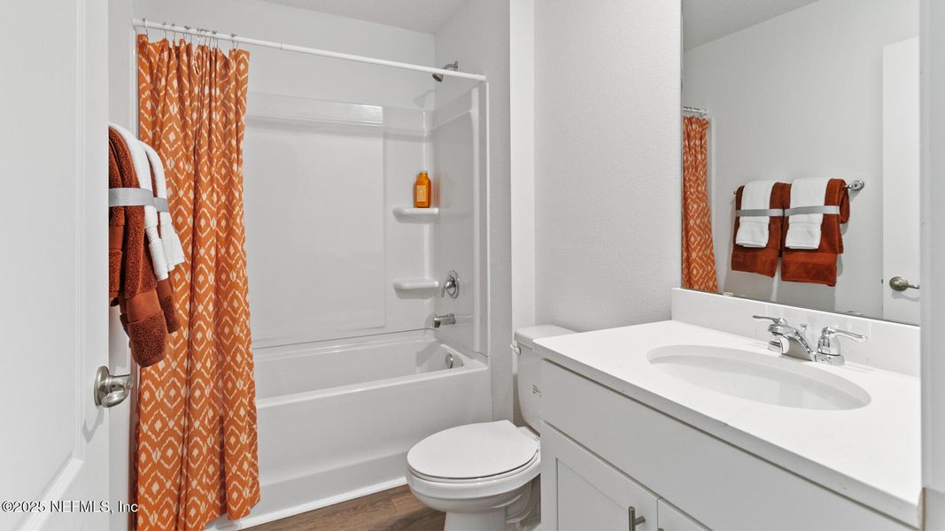 Furnished interior view inside a new home in Sawmill Branch, Palm Coast (Image 30).