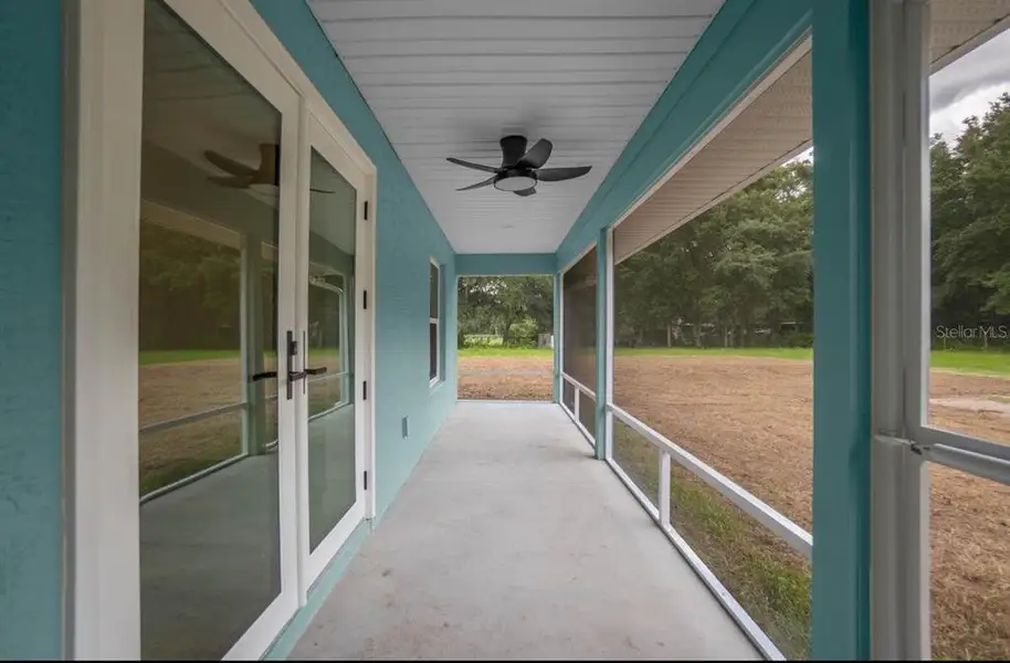 Exterior details and patio area of a home in , Webster (Image 26).
