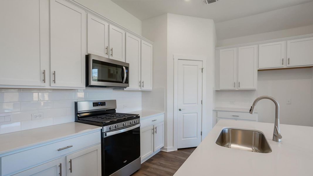 Furnished interior view inside a new home in Rosenbusch Ranch, Leander (Image 5). Furnished interior view inside a new home in Rosenbusch Ranch, Leander (Image 5).