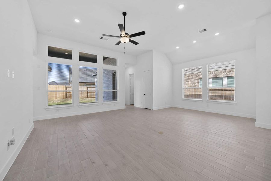 Representative unfurnished interior of a home built from the Summerton by Chesmar Homes in Grange, Katy (Image 12).