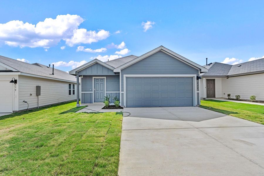 Front exterior of a new home in , San Marcos, TX, highlighting curb appeal (Image 1). Front exterior of a new home in , San Marcos, TX, highlighting curb appeal (Image 1).