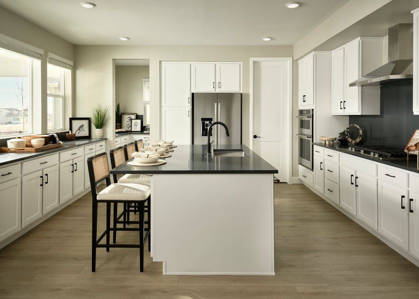 Furnished interior view inside a new home in Barefoot, Firestone (Image 4).