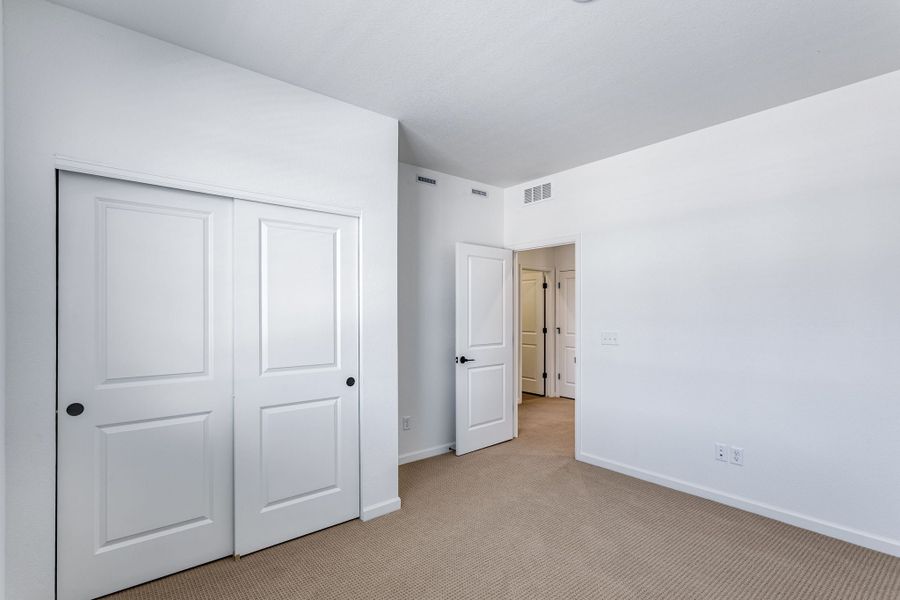 Spacious, unfurnished interior of a new home in Westside Crossing, Berthoud (Image 29).