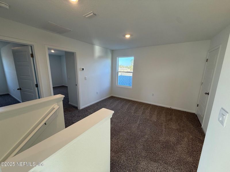 Spacious, unfurnished interior of a new home in The Arbors, Jacksonville (Image 13).