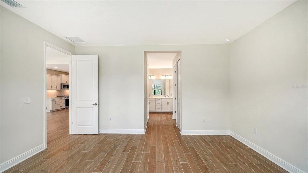 Spacious, unfurnished interior of a new home in Vicenza Real Estate and Homes for Sale in North Venice, FL - Neal Communities, Nokomis (Image 29). Spacious, unfurnished interior of a new home in Vicenza Real Estate and Homes for Sale in North Venice, FL - Neal Communities, Nokomis (Image 29).