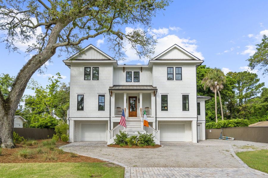 Front exterior of a new home in , Isle Of Palms, SC, highlighting curb appeal (Image 2). Front exterior of a new home in , Isle Of Palms, SC, highlighting curb appeal (Image 2).