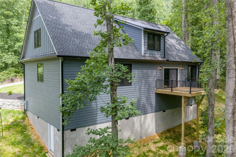 Exterior details and patio area of a home in , Candler (Image 22).