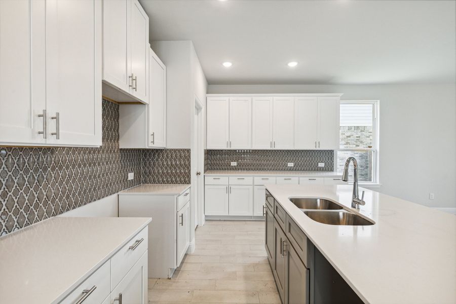 Representative furnished interior of a home built from the Lyla by Megatel Homes in Santorini, Seagoville (Image 3).