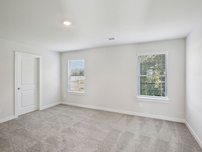 The primary suite offers a private retreat.