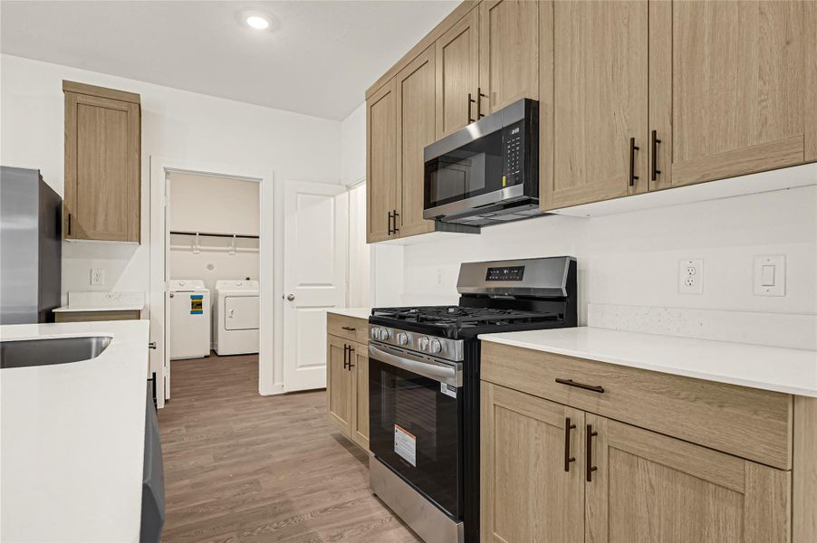 Furnished interior view inside a new home in Emberly, Beasley (Image 10).