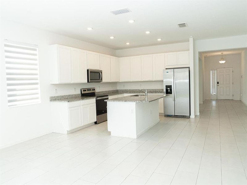 Furnished interior view inside a new home in Cypress Park Estates, Haines City (Image 7).