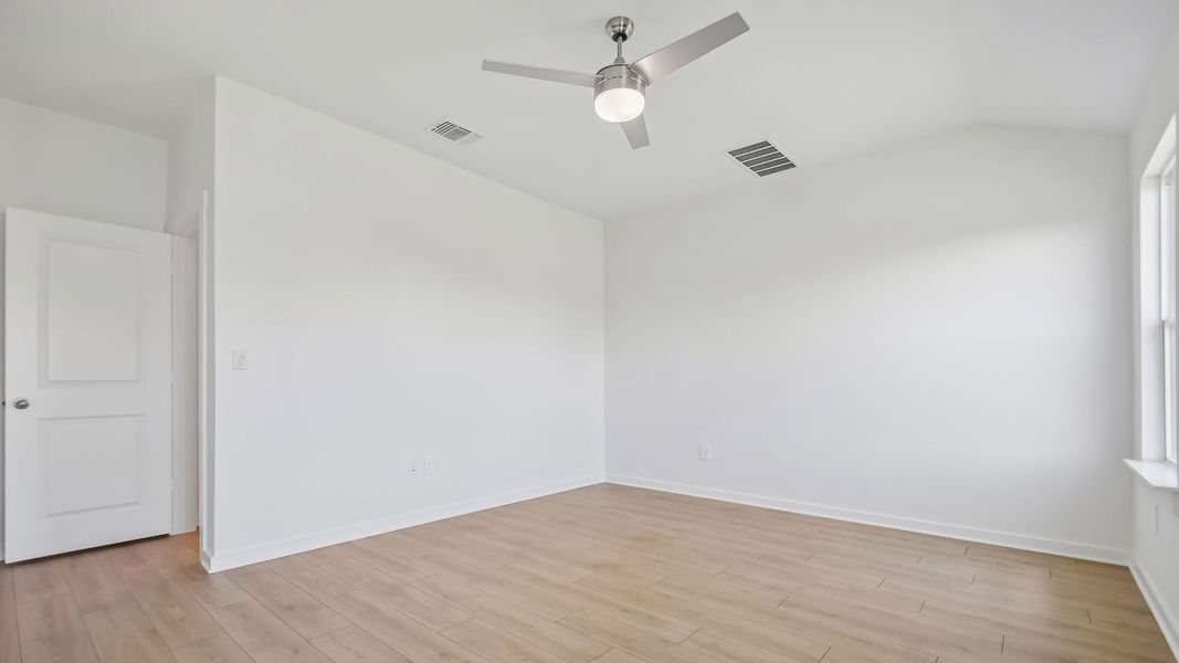 Spacious, unfurnished interior of a new home in Trails at Wildhorse, Austin (Image 38).