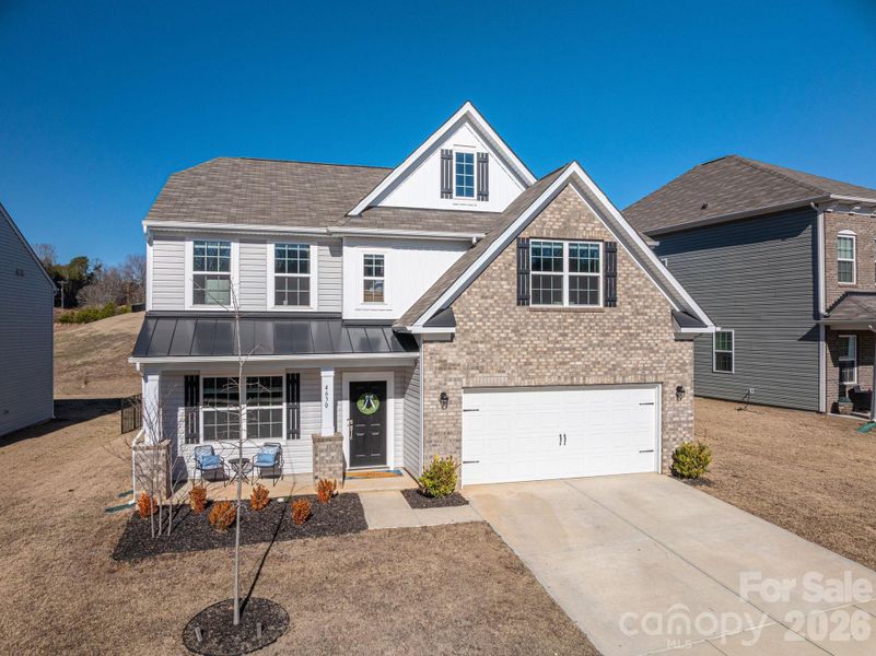 Front exterior of a new home in , Maiden, NC, highlighting curb appeal (Image 1). Front exterior of a new home in , Maiden, NC, highlighting curb appeal (Image 1).
