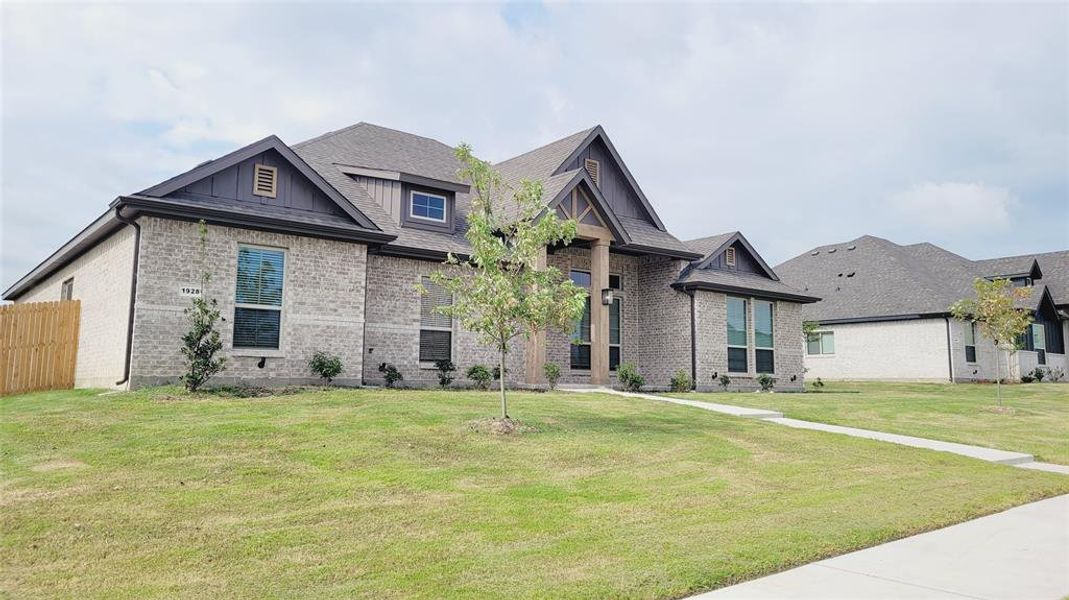 Front exterior of a new home in , DeSoto, TX, highlighting curb appeal (Image 2).