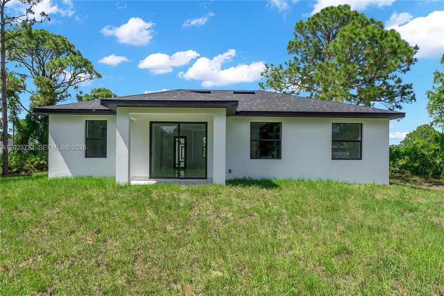 Exterior details and patio area of a home in , Lehigh Acres (Image 4).