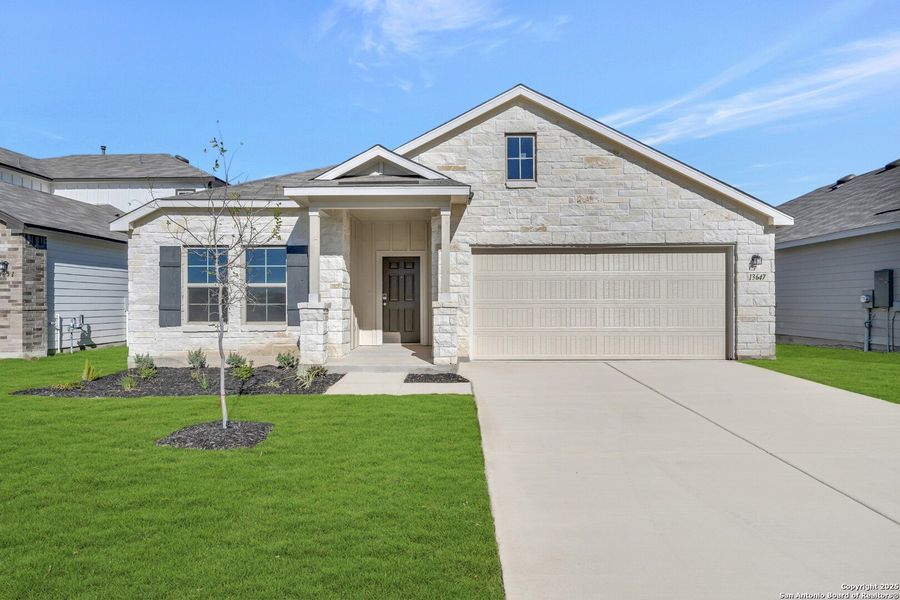 Front exterior of a new home in Winding Brook, San Antonio, TX, highlighting curb appeal (Image 18).