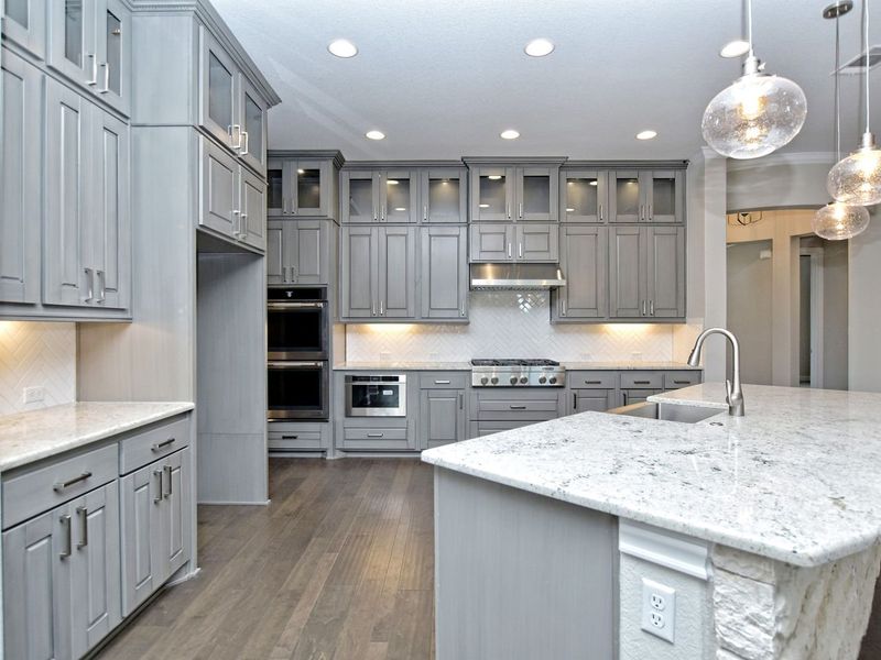 Representative furnished interior of a home built from the Madera II by Giddens Homes in Scofield Farms Estates, Georgetown (Image 174).
