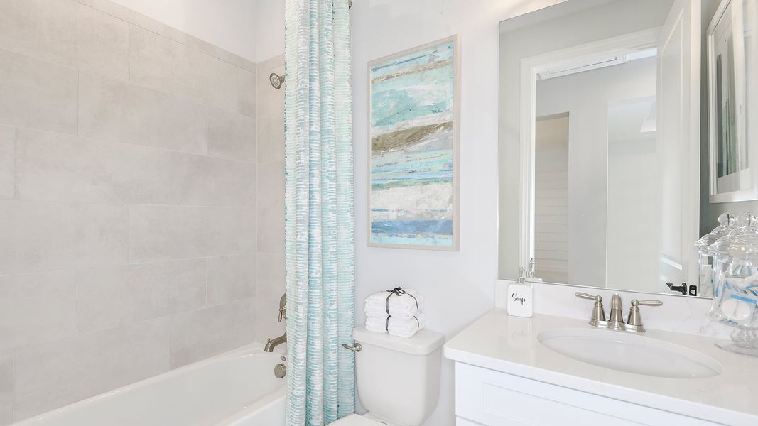 Furnished interior view inside a new home in Esplanade at Tradition, Port St. Lucie (Image 14). Furnished interior view inside a new home in Esplanade at Tradition, Port St. Lucie (Image 14).