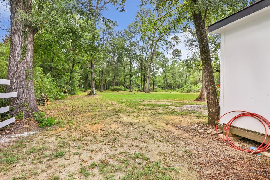 Front exterior of a new home in , Dayton, TX, highlighting curb appeal (Image 14). Front exterior of a new home in , Dayton, TX, highlighting curb appeal (Image 14).