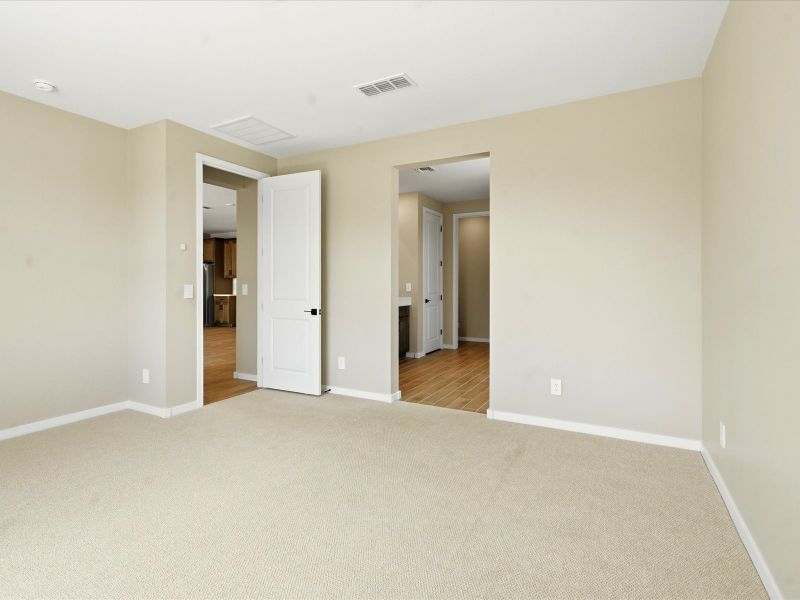 Spacious, unfurnished interior of a new home in Blossom Rock Signature Series, Apache Junction (Image 11).