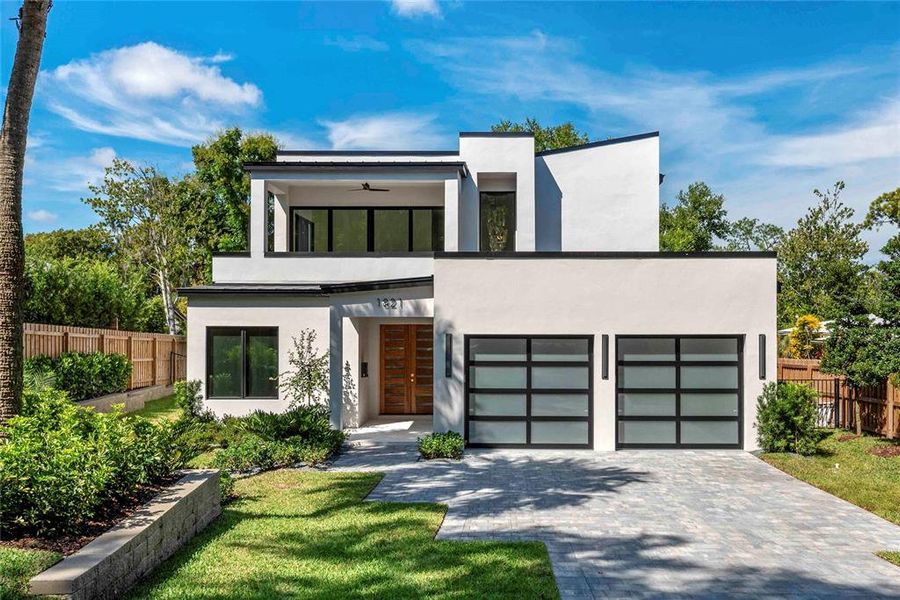 Front exterior of a new home in , Winter Park, FL, highlighting curb appeal (Image 21). Front exterior of a new home in , Winter Park, FL, highlighting curb appeal (Image 21).