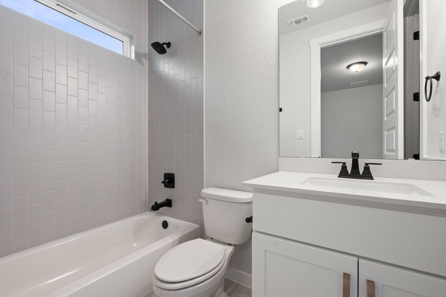 Furnished interior view inside a new home in Lagos Reserve, Manor (Image 16).